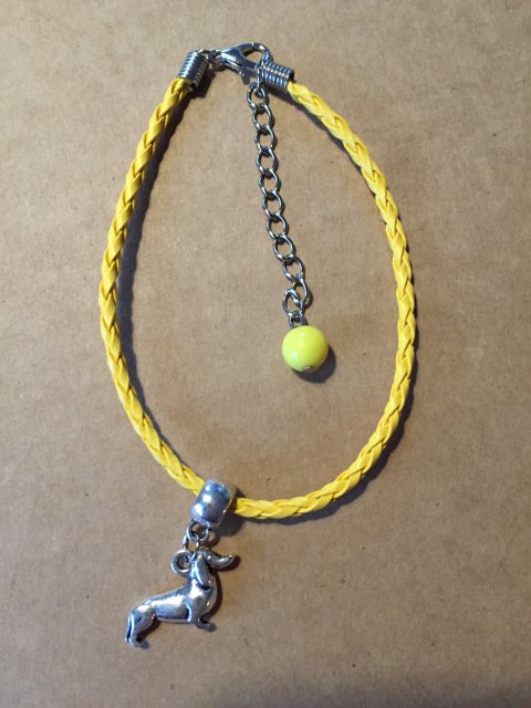 armbnd m/gravhund, gul